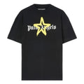 A black short-sleeve crewneck t-shirt featuring a large yellow star graphic and the white gothic 'Palm Angels' brand name printed across the chest.