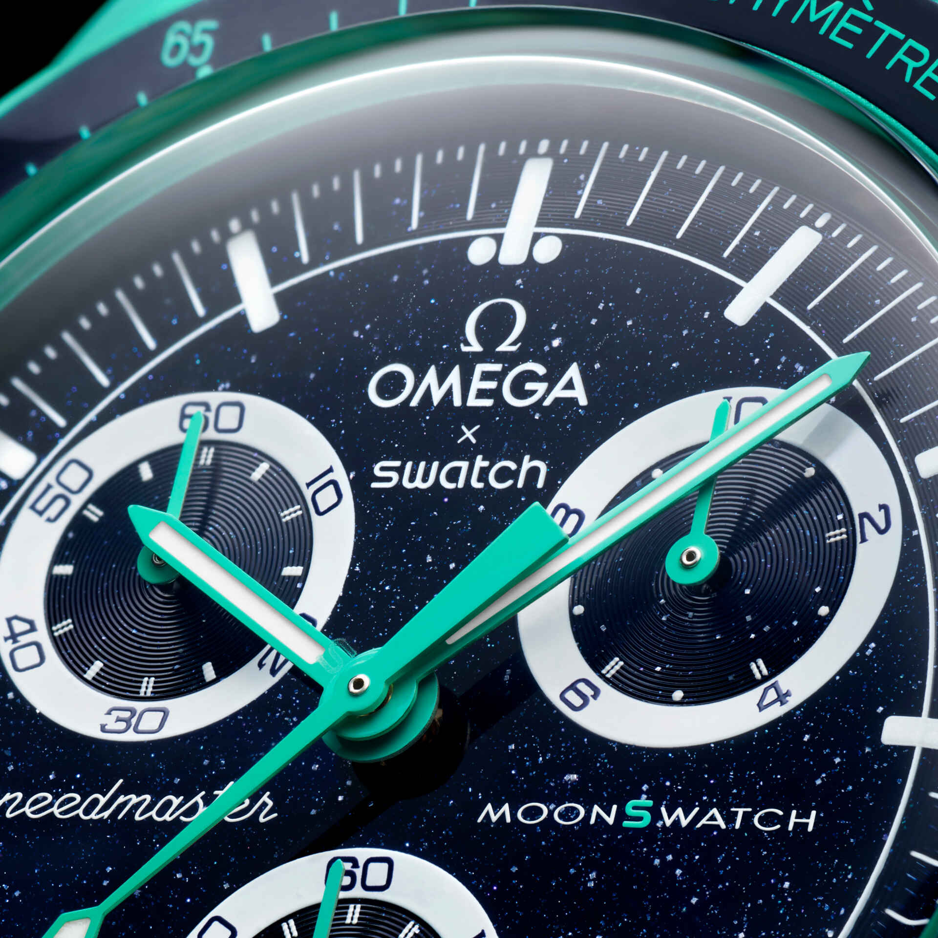 Close-up of an Omega x Swatch watch with a blue and green design.