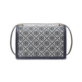 A Tory Burch shoulder bag featuring a navy blue and gray monogram patterned body, a thin dark gray strap, and gold-tone hardware on a plain white background.