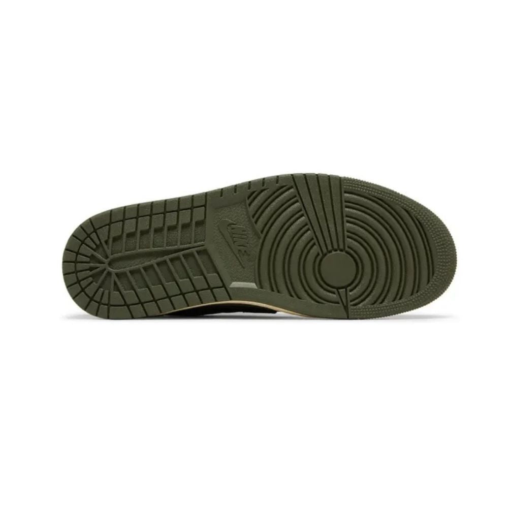 The outsole of a Nike shoe in olive green, showing the tread pattern and embossed Nike Swoosh, photographed on a white background.